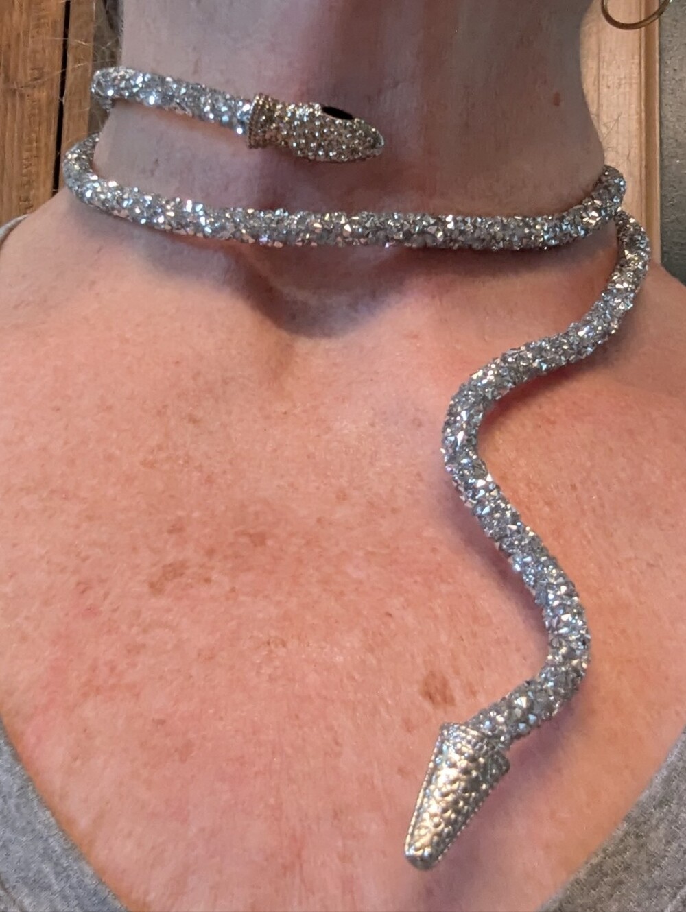 Silver-toned, flexible rhinestone snake choker necklace snake-head & tail ends.
